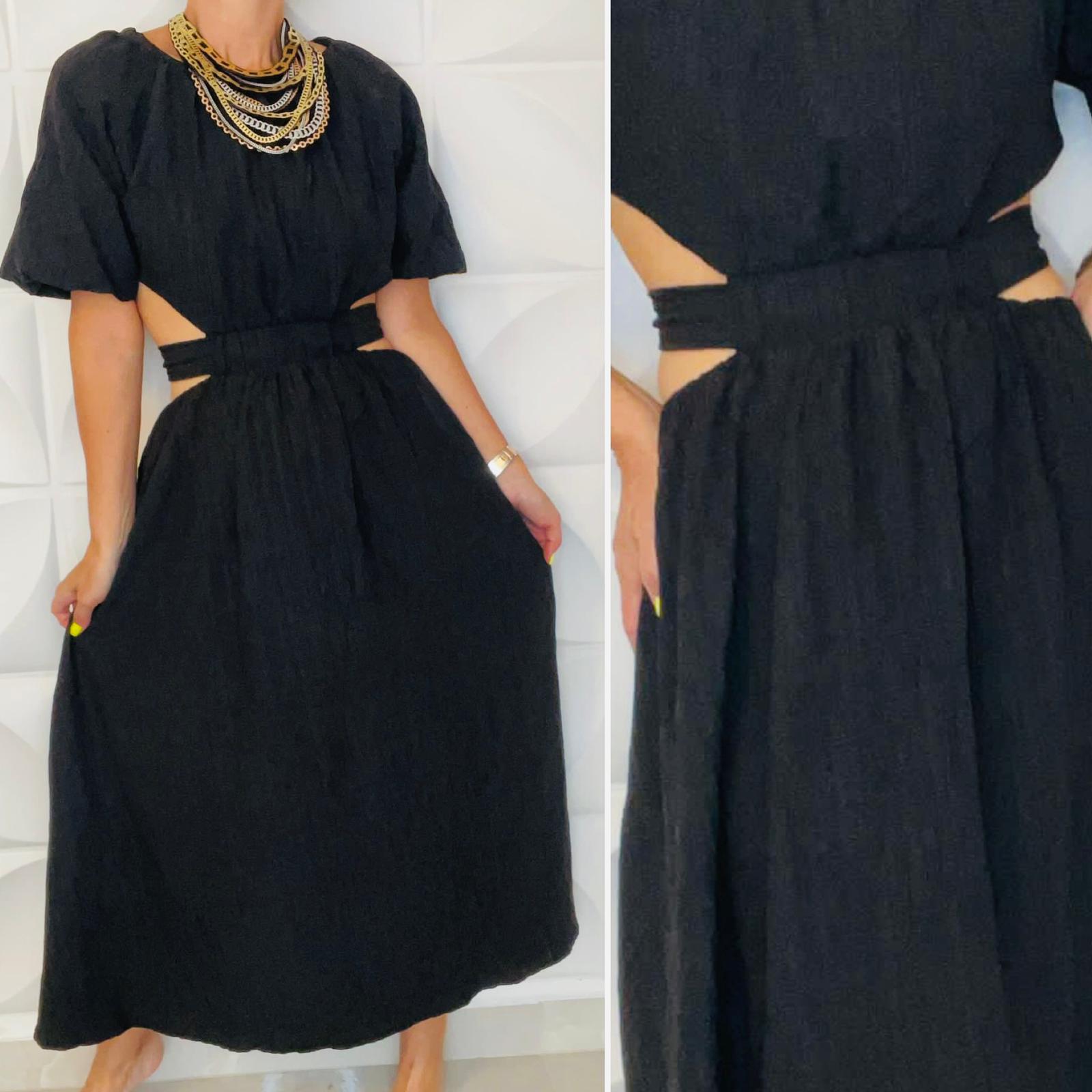 Traje negro mangas 3/4